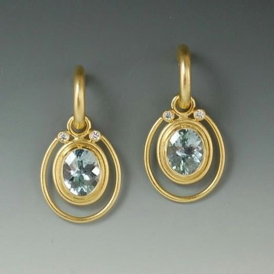 Orecchini vintage in oro con cristallo azzurro chiaro