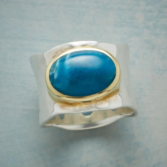Anello vintage in argento con pietra blu ovale