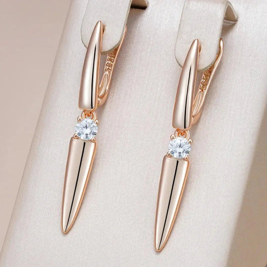 Orecchini con punte lucide in oro elegante