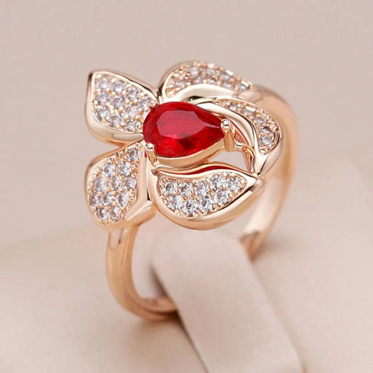 Anello elegante con cristallo in oro rosso