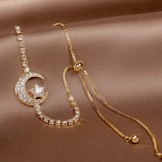 Braccialetti con pendente a luna in zirconia e oro