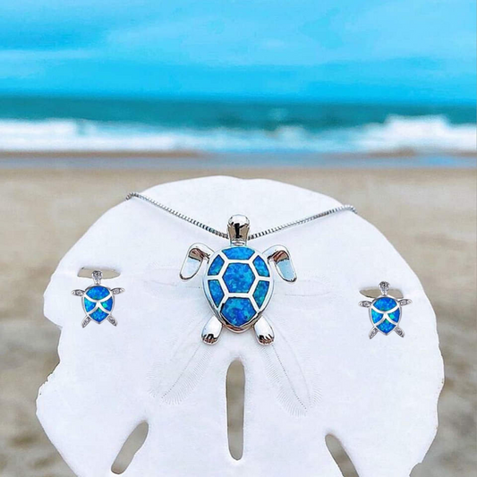 Set di collana e orecchini con tartarughe marine in opale