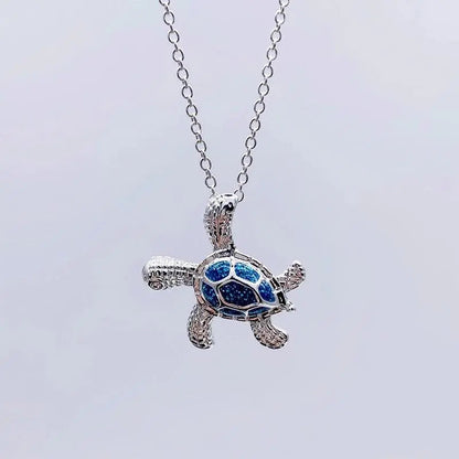 Collana con tartaruga marina in opale blu