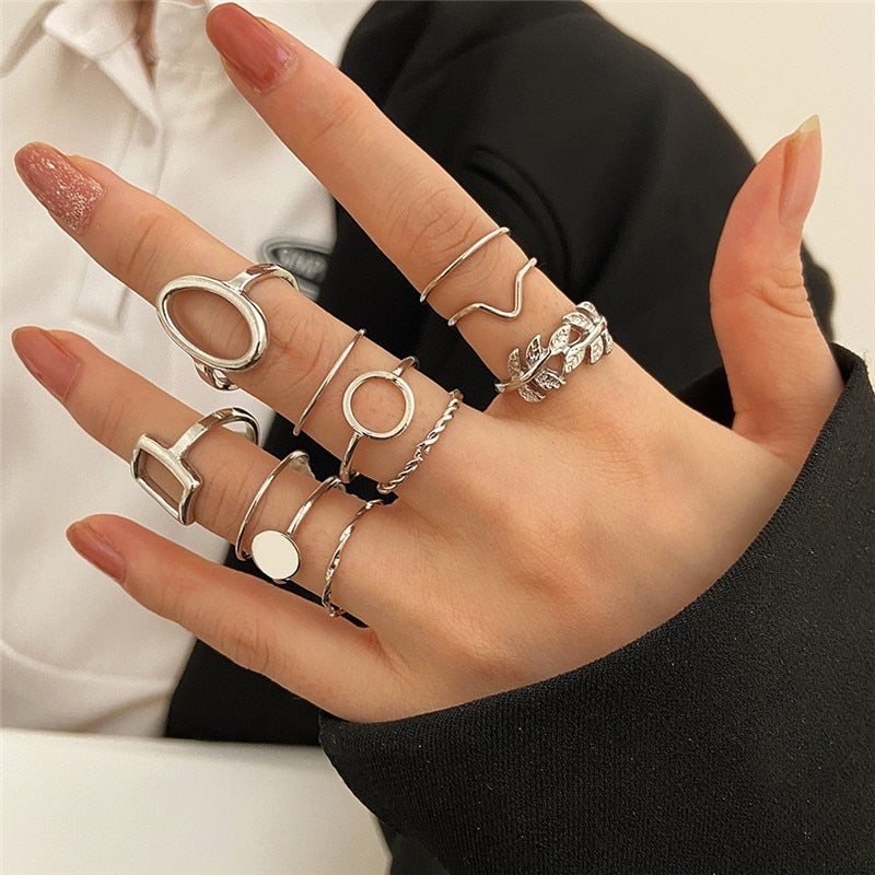 Set con 11 anelli vintage in argento