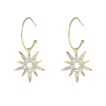 Orecchini a stella in oro e argento