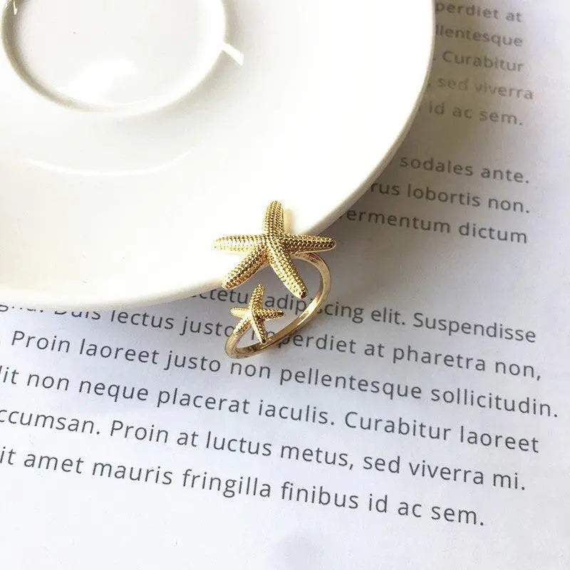 Anello Stella Marina Regolabile in Argento e Oro