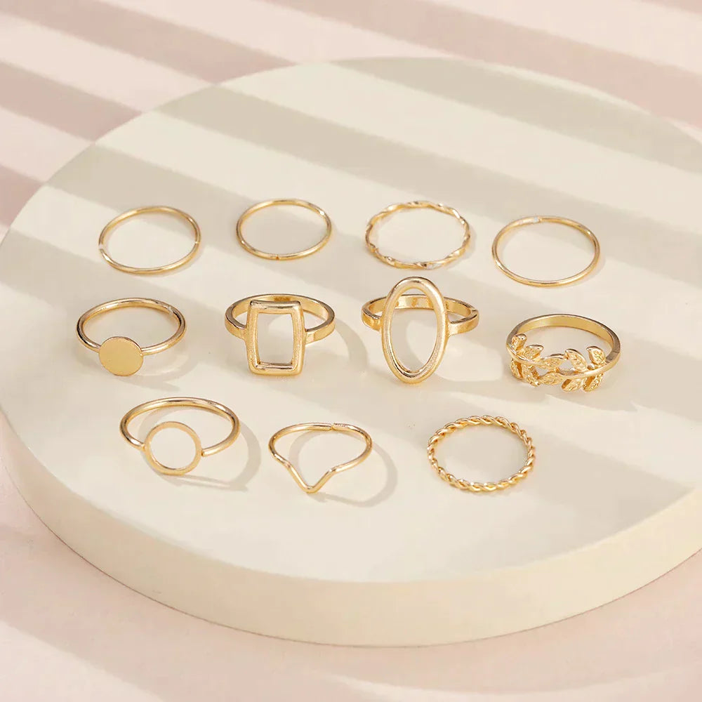 Set con 11 anelli vintage in argento