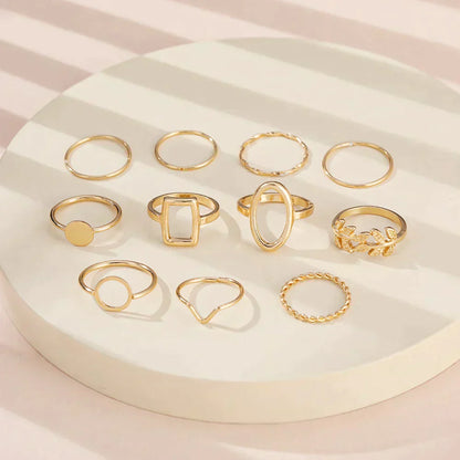 Set con 11 anelli vintage in argento