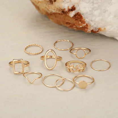 Set con 11 anelli vintage in argento