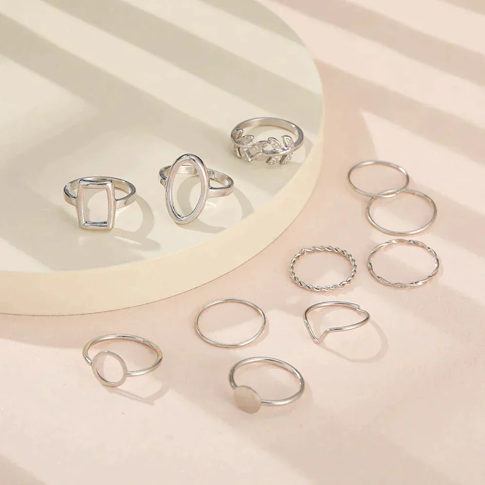 Set con 11 anelli vintage in argento