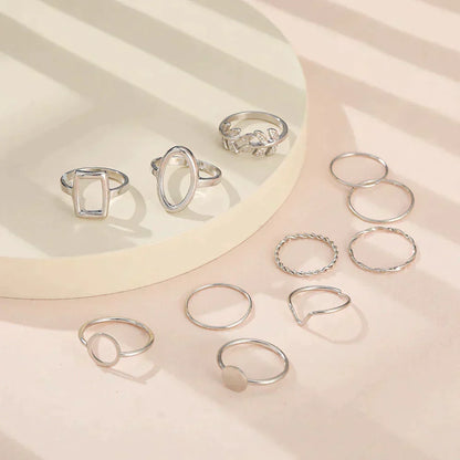 Set con 11 anelli vintage in argento