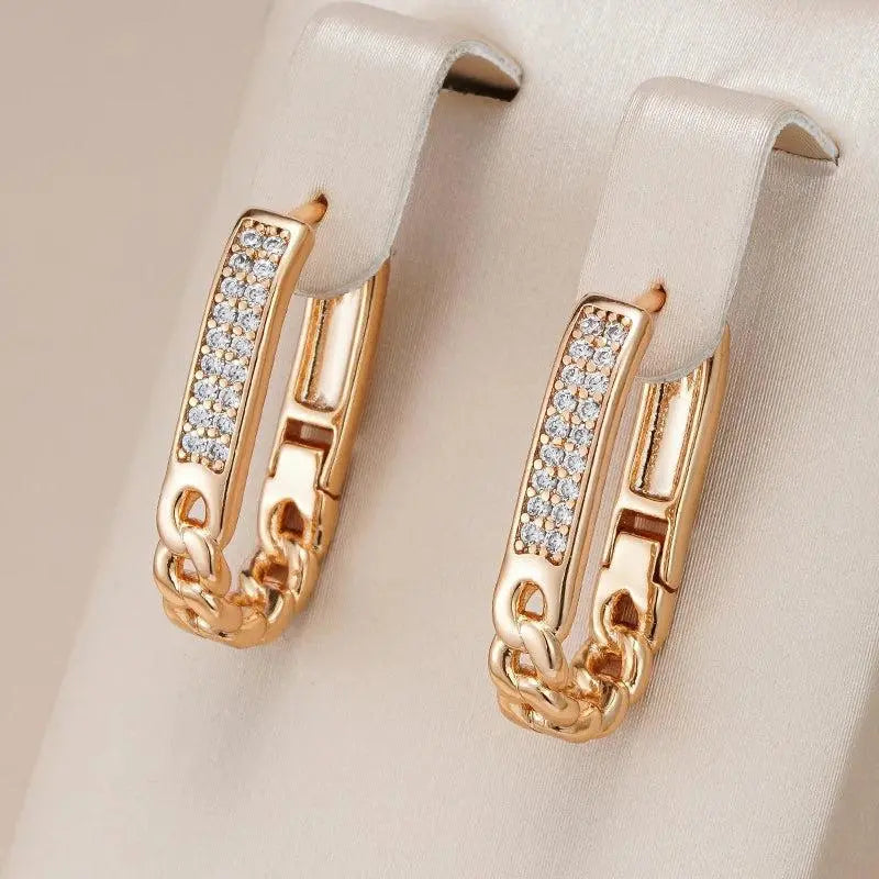 Orecchini eleganti a catena con zirconia in oro