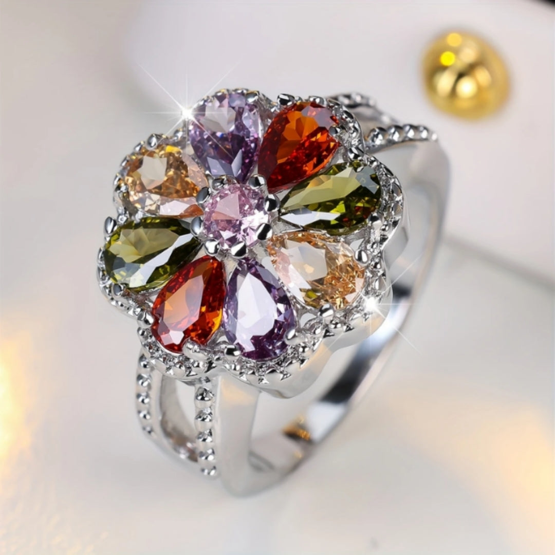 Frequenza di anello Daisy con pietre colorate