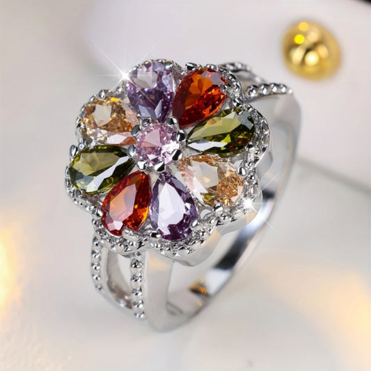 Frequenza di anello Daisy con pietre colorate