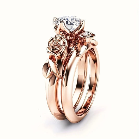 Anello squisito in oro rosa con fiori di rosa