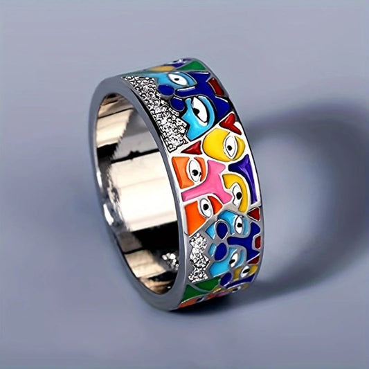 Anello di argento con occhi colorati