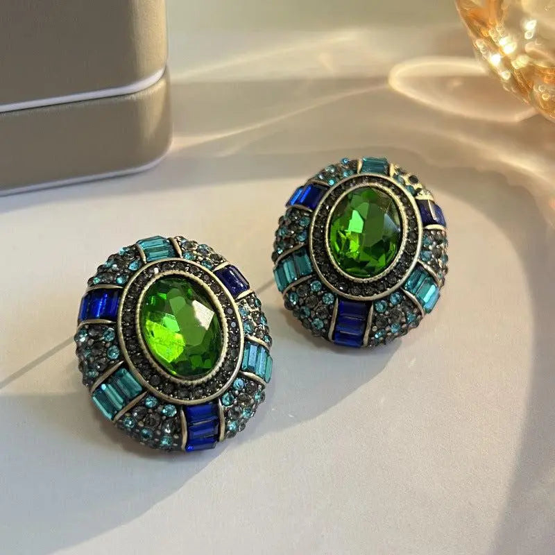 Orecchini vintage con cristallo verde e zirconia blu