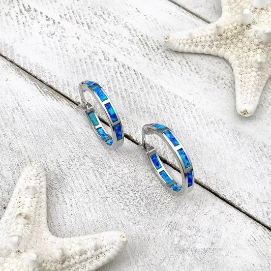 Anelli di lusso in argento e opale ispirati all'oceano
