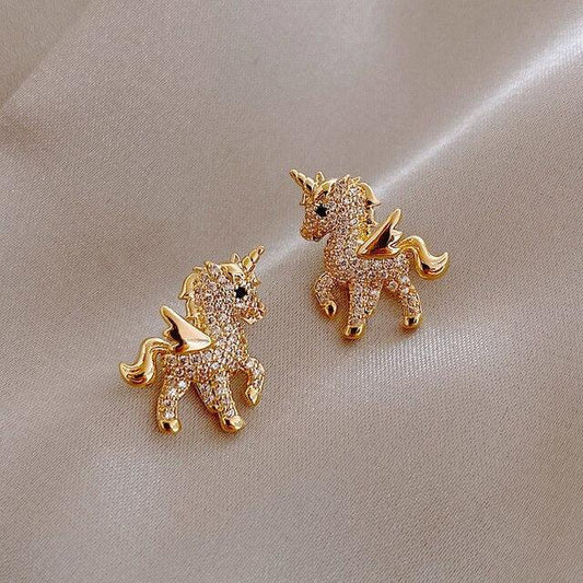 Orecchini a unicornio con zirconi in oro