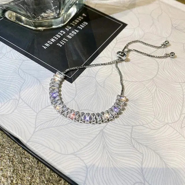 Bracciale regolabile con zirconi a cubo in oro e argento