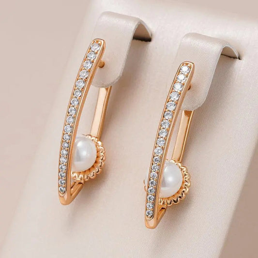 Orecchini eleganti con strass e perle