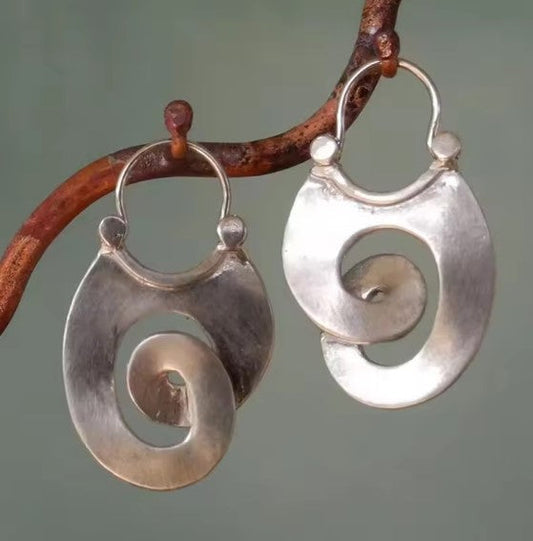 Orecchini pendenti vintage a spirale in argento