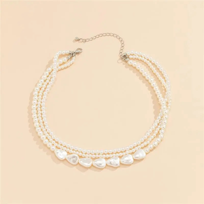 Collana di pietra bianca e perle in oro