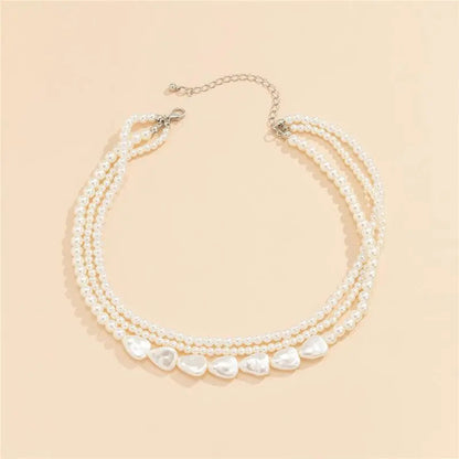 Collana di pietra bianca e perle in oro