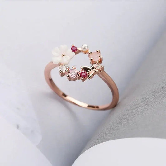 anello floreale con zirconi rosa in oro