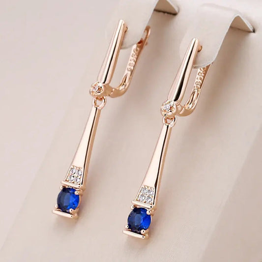 Orecchini con pendente in cristallo blu e oro