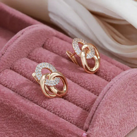 Orecchini eleganti con zirconi in oro
