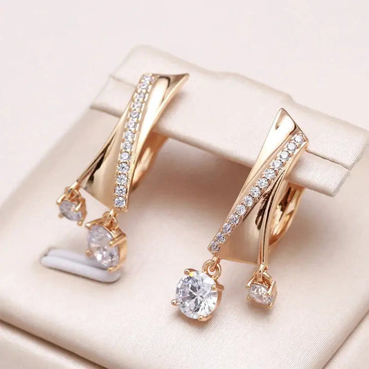 Orecchini eleganti con cristallo bianco in oro