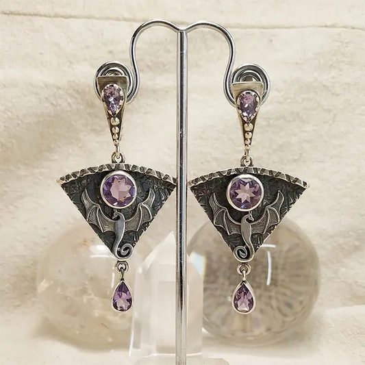 Orecchini vintage in argento e zaffiro viola