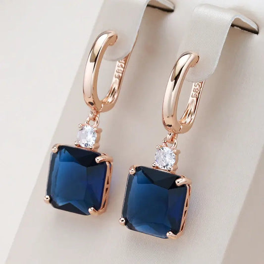 Orecchini eleganti con cristallo blu scuro in oro
