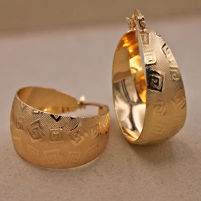 Orecchini etnici in oro