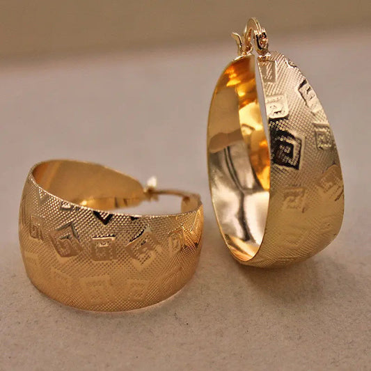 Orecchini etnici in oro