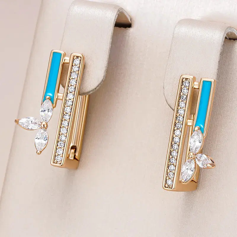 Orecchini eleganti con smalto blu e zirconia in oro