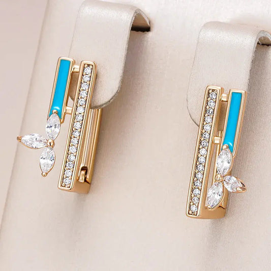 Orecchini eleganti con smalto blu e zirconia in oro