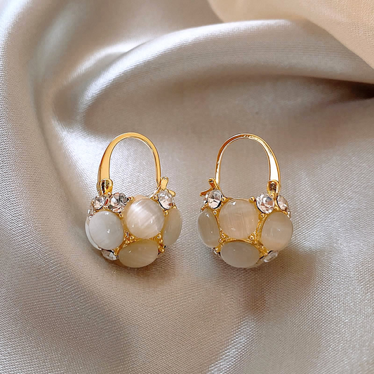 Orecchini con perle e cristalli dorati