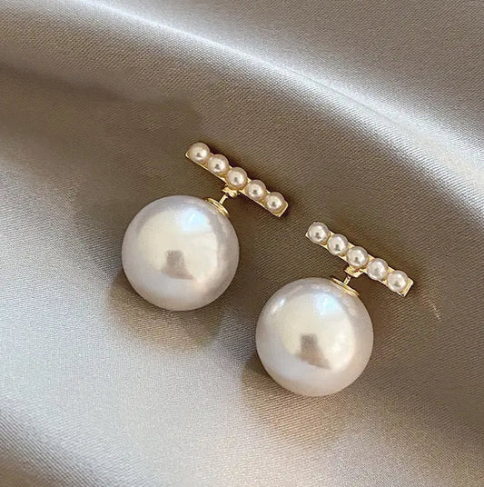 Orecchini T-Pearl in Oro