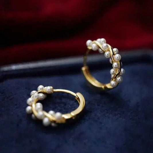 Orecchini con perle intrecciate placcate in oro