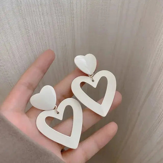 Orecchini eleganti a cuore vuoto bianchi