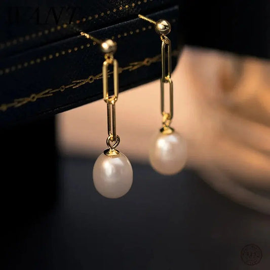 Orecchini vintage pendenti con perle