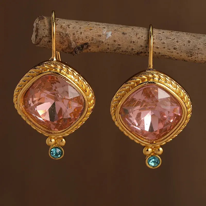 Orecchini vintage in oro rosa con cristalli