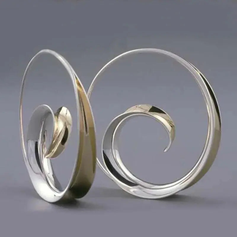 Orecchini vintage con onde a spirale