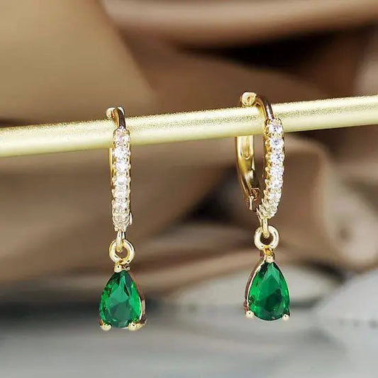 Orecchini con cristallo pendente in oro
