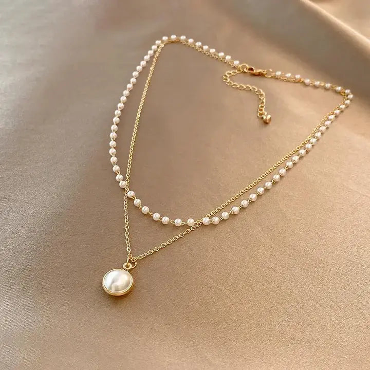 Collana elegante con perle in oro