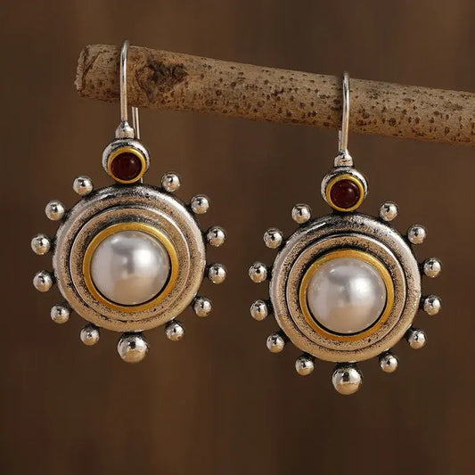 Orecchini vintage in argento e oro incastonati con perle