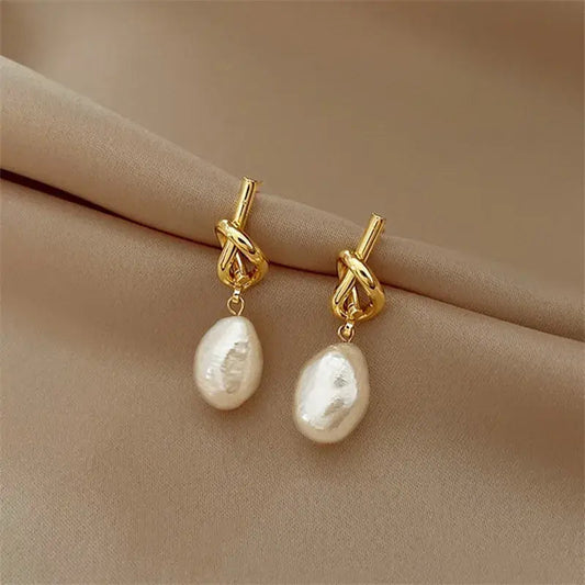 Orecchini eleganti in stile Barocco con perle in oro