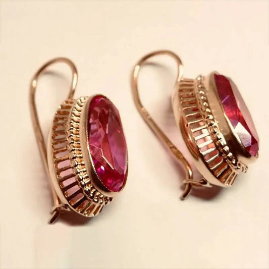 Orecchini vintage rossi in cristallo con placcatura rosa d'oro